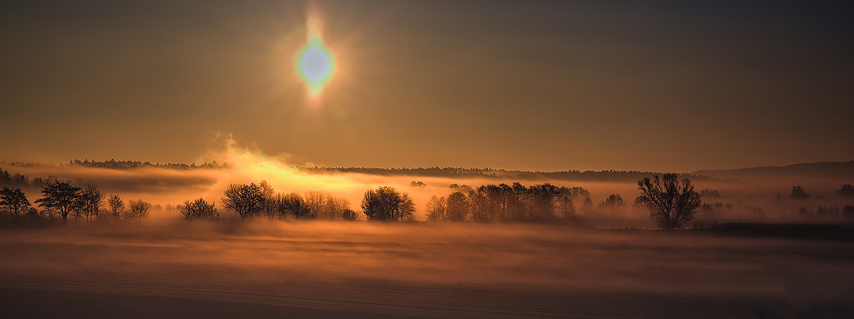 Sonnenaufgang im Nebel