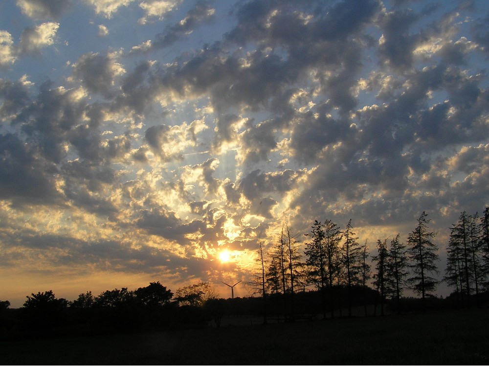 Sonne und Wolken