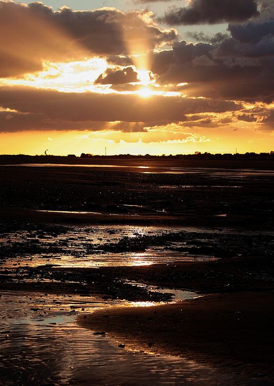 Sonnenuntergang im Watt vor Merville