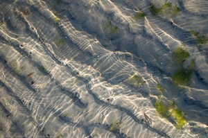 Lichtwellen kreuzen Sandwellen