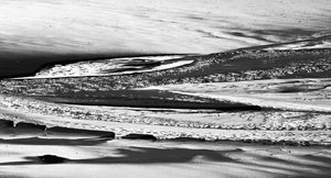 Prilabfluss am körnigen Sandstrand