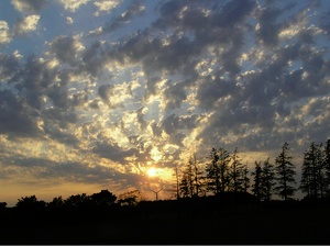 Sonne und Wolken